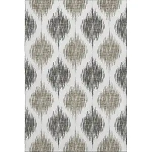 Photo of Taupe And Ivory Ikat Washable Area Rug With UV Protection