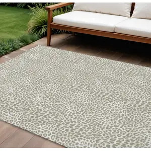 Photo of Taupe And Ivory Leopard Print Washable Indoor Outdoor Area Rug