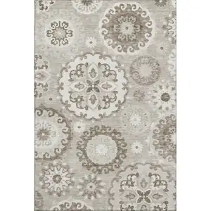 Photo of Taupe And Ivory Medallion Washable Area Rug With UV Protection