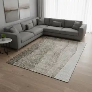 Photo of Taupe And Ivory Ombre Washable Area Rug With UV Protection