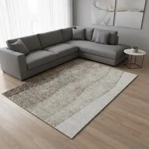 Photo of Taupe And Ivory Ombre Washable Area Rug With UV Protection