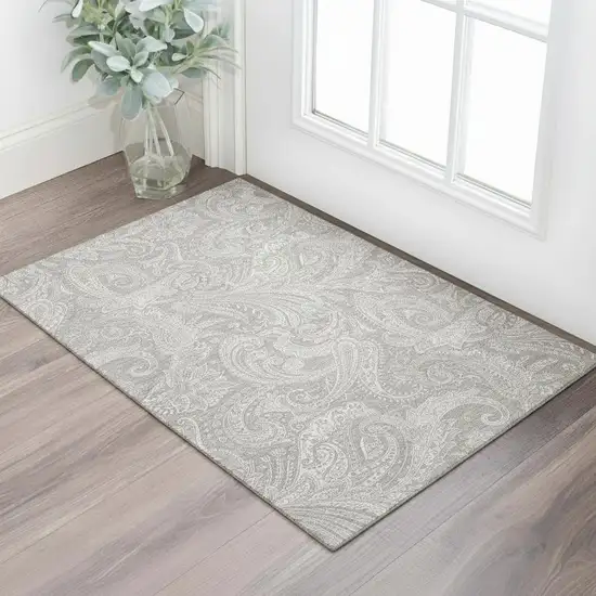 Taupe And Ivory Paisley Washable Area Rug With UV Protection Photo 1