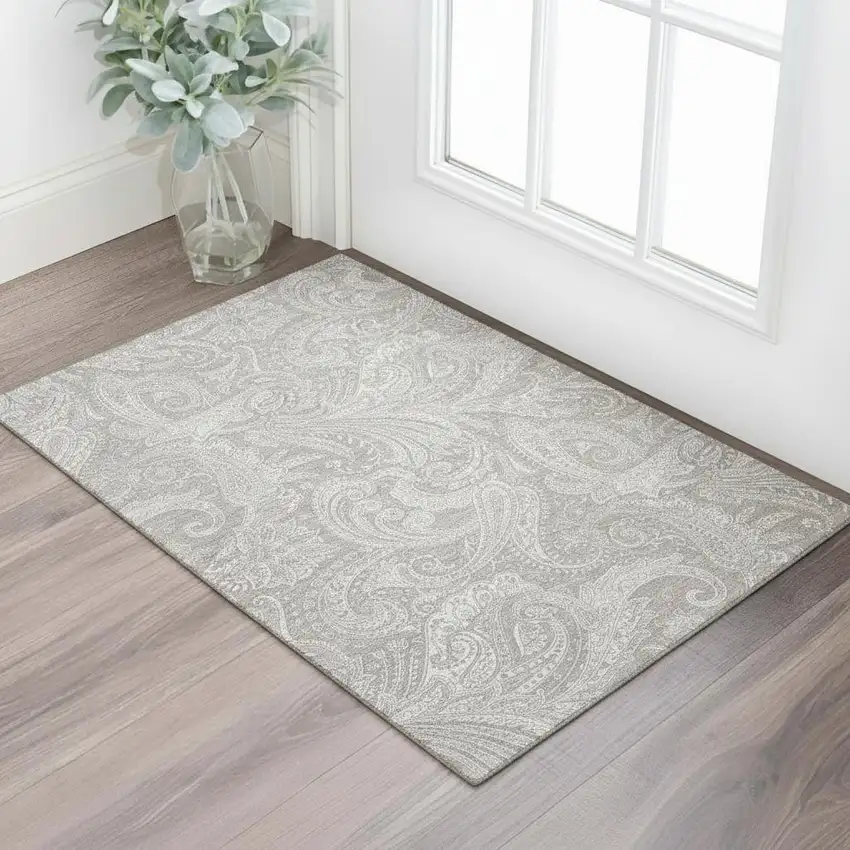 Taupe And Ivory Paisley Washable Area Rug With UV Protection Photo 1
