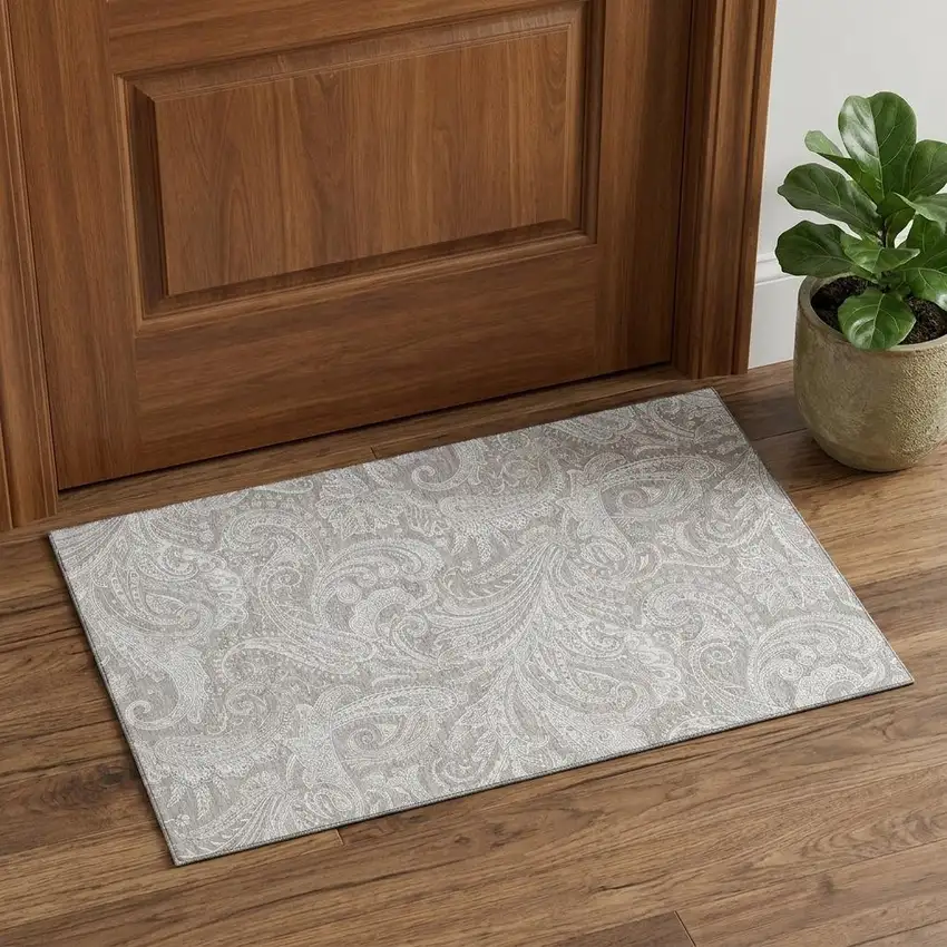 Taupe And Ivory Paisley Washable Area Rug With UV Protection Photo 1
