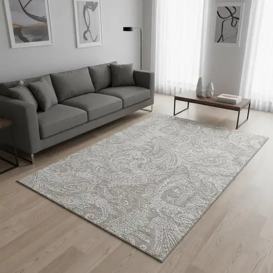Taupe And Ivory Paisley Washable Area Rug With UV Protection Photo 1