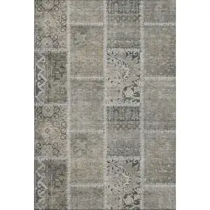 Photo of Taupe And Ivory Patchwork Washable Area Rug With UV Protection