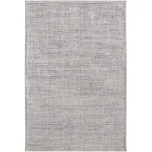 Photo of Taupe And Ivory Plaid Power Loom Distressed Stain Resistant Area Rug