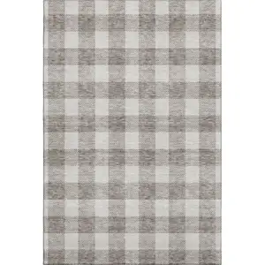 Photo of Taupe And Ivory Plaid Washable Area Rug With UV Protection