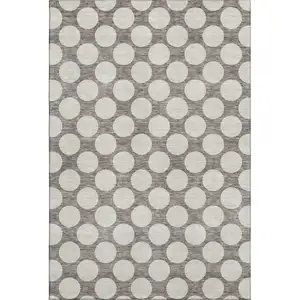 Photo of Taupe And Ivory Polka Dot Washable Area Rug With UV Protection