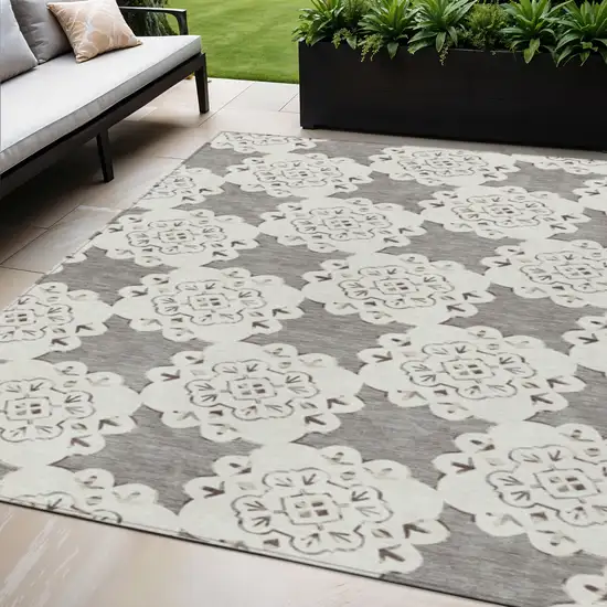 Taupe And Ivory Quatrefoil Washable Indoor Outdoor Area Rug Photo 1