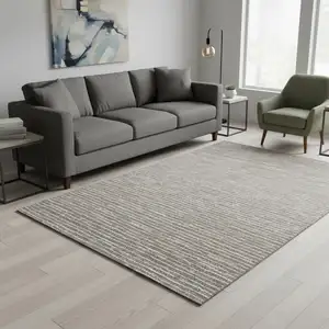 Photo of Taupe And Ivory Striped Washable Area Rug With UV Protection