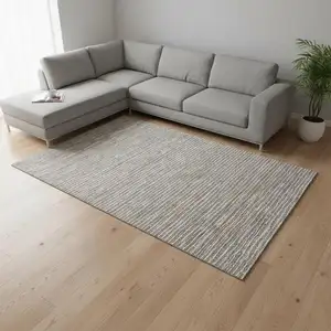 Photo of Taupe And Ivory Striped Washable Area Rug With UV Protection