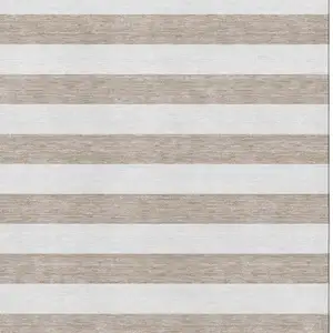 Photo of Taupe And Ivory Striped Washable Area Rug With UV Protection