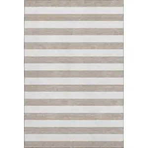 Photo of Taupe And Ivory Striped Washable Area Rug With UV Protection