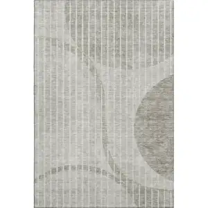 Photo of Taupe And Ivory Striped Washable Area Rug With UV Protection
