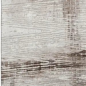 Photo of Taupe And Ivory Striped Washable Area Rug With UV Protection