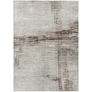 Photo of Taupe And Ivory Striped Washable Indoor Outdoor Area Rug
