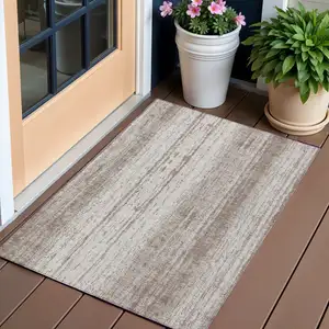 Photo of Taupe And Ivory Striped Washable Indoor Outdoor Area Rug