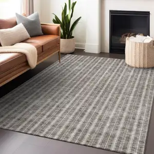 Photo of Taupe And Ivory Striped Washable Indoor Outdoor Area Rug