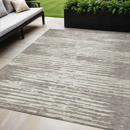 Taupe And Ivory Striped Washable Indoor Outdoor Area Rug Photo 1
