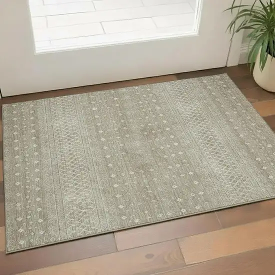 Taupe And Ivory Tribal Washable Area Rug With UV Protection Photo 1