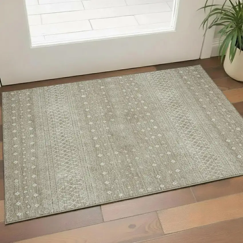 Taupe And Ivory Tribal Washable Area Rug With UV Protection Photo 1