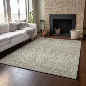 Photo of Taupe And Ivory Tribal Washable Area Rug With UV Protection