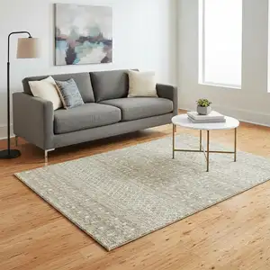 Photo of Taupe And Ivory Tribal Washable Area Rug With UV Protection