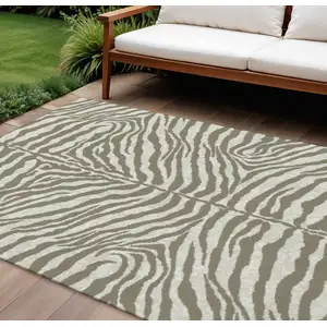 Photo of Taupe And Ivory Zebra Print Washable Indoor Outdoor Area Rug