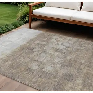 Photo of Taupe And Silver Abstract Washable Indoor Outdoor Area Rug