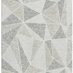 Photo of Taupe And Silver Geometric Washable Area Rug With UV Protection
