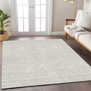 Photo of Taupe And Silver Geometric Washable Indoor Outdoor Area Rug