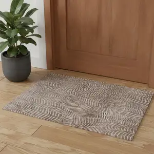 Photo of Taupe And Tan Animal Print Area Rug