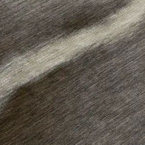 Photo of Taupe Beige And Black Abstract Washable Indoor Outdoor Area Rug