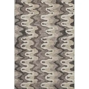 Photo of Taupe Beige And Brown Abstract Washable Area Rug With UV Protection