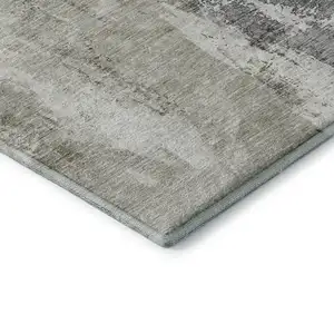 Photo of Taupe Beige And Brown Abstract Washable Area Rug With UV Protection