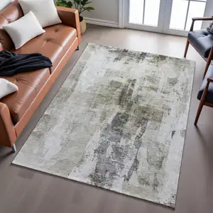 Photo of Taupe Beige And Brown Abstract Washable Area Rug With UV Protection