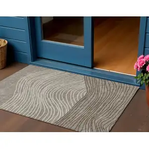 Photo of Taupe Beige And Brown Striped Washable Indoor Outdoor Area Rug