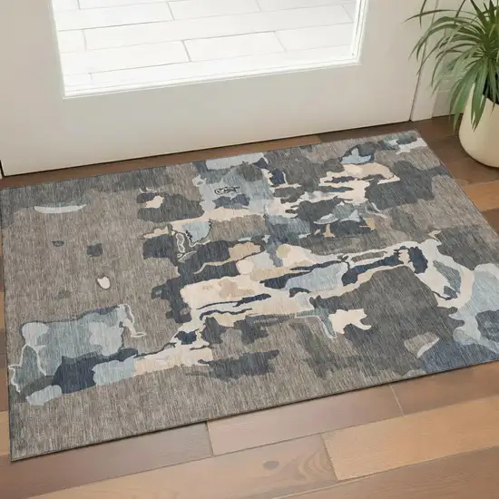 Taupe Beige And Cream Abstract Washable Area Rug With UV Protection Photo 1