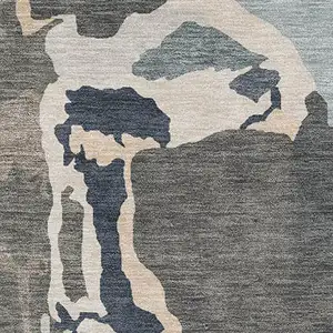 Photo of Taupe Beige And Cream Abstract Washable Area Rug With UV Protection