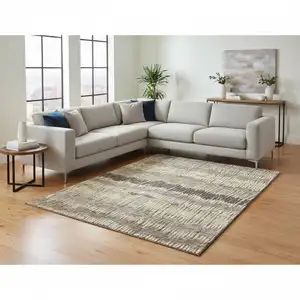 Photo of Taupe Beige And Cream Striped Washable Area Rug With UV Protection