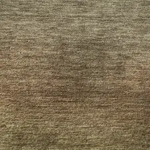 Photo of Taupe Beige And Gold Ombre Washable Area Rug With UV Protection