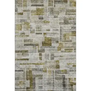 Photo of Taupe Beige And Gold Striped Washable Area Rug With UV Protection