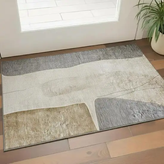 Taupe Beige And Gray Abstract Washable Area Rug With UV Protection Photo 1