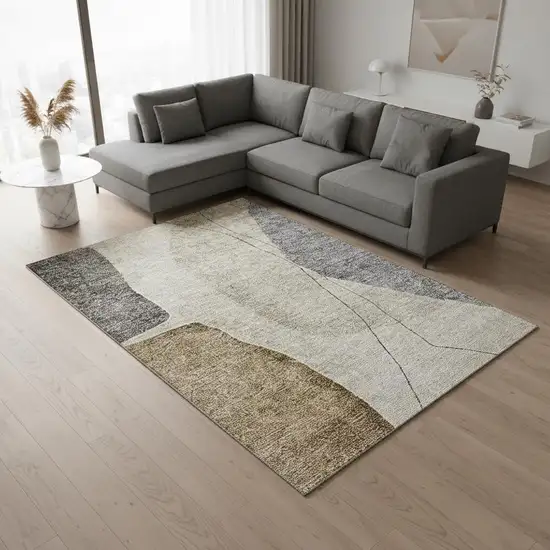 Taupe Beige And Gray Abstract Washable Area Rug With UV Protection Photo 1