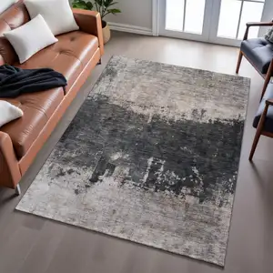 Photo of Taupe Beige And Gray Abstract Washable Area Rug With UV Protection