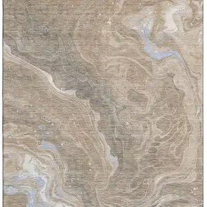Photo of Taupe Beige And Gray Abstract Washable Area Rug With UV Protection
