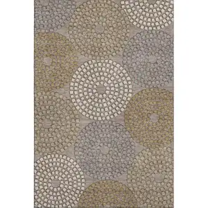 Photo of Taupe Beige And Gray Geometric Washable Area Rug With UV Protection