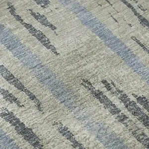 Photo of Taupe Beige And Gray Striped Washable Area Rug With UV Protection