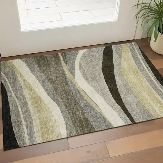 Taupe Beige And Ivory Abstract Washable Area Rug With UV Protection Photo 1